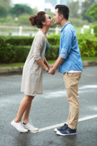 Taking initiative on reconnecting, like this woman leaning in towards her partner, will help get you out of feeling closed off in your relationship.