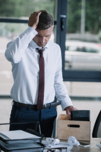 Feeling rejected, dismissed, or like your pride has been injured can leave you feeling upset, bewildered, and distanced, like the man in this photo.