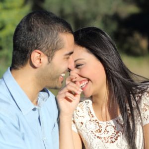 Empathy and compassion can take us from pain to reuniting, making our relationship happier like that of this smiling couple.