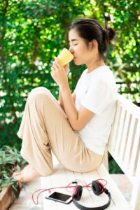 Being kind to ourselves and reinforcing our good nature will help us be happier. Take a contemplative break, like the woman pictured relaxing here.