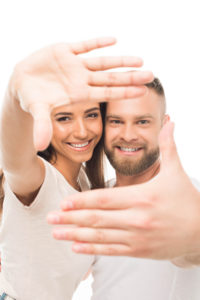 Reframing can put you and your partner back in a happier situation, like the couple pictured here.