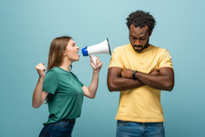 Our habits and the way we manage our emotions may push those close to us away, like the angry woman pictured yelling at her mate.