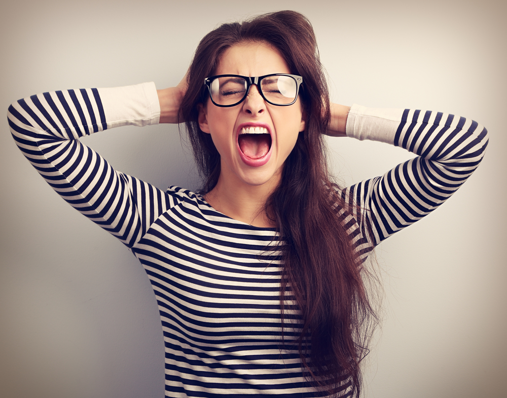 When anger takes over we may not know what to do with ourselves, like this screaming woman at her wit's end.